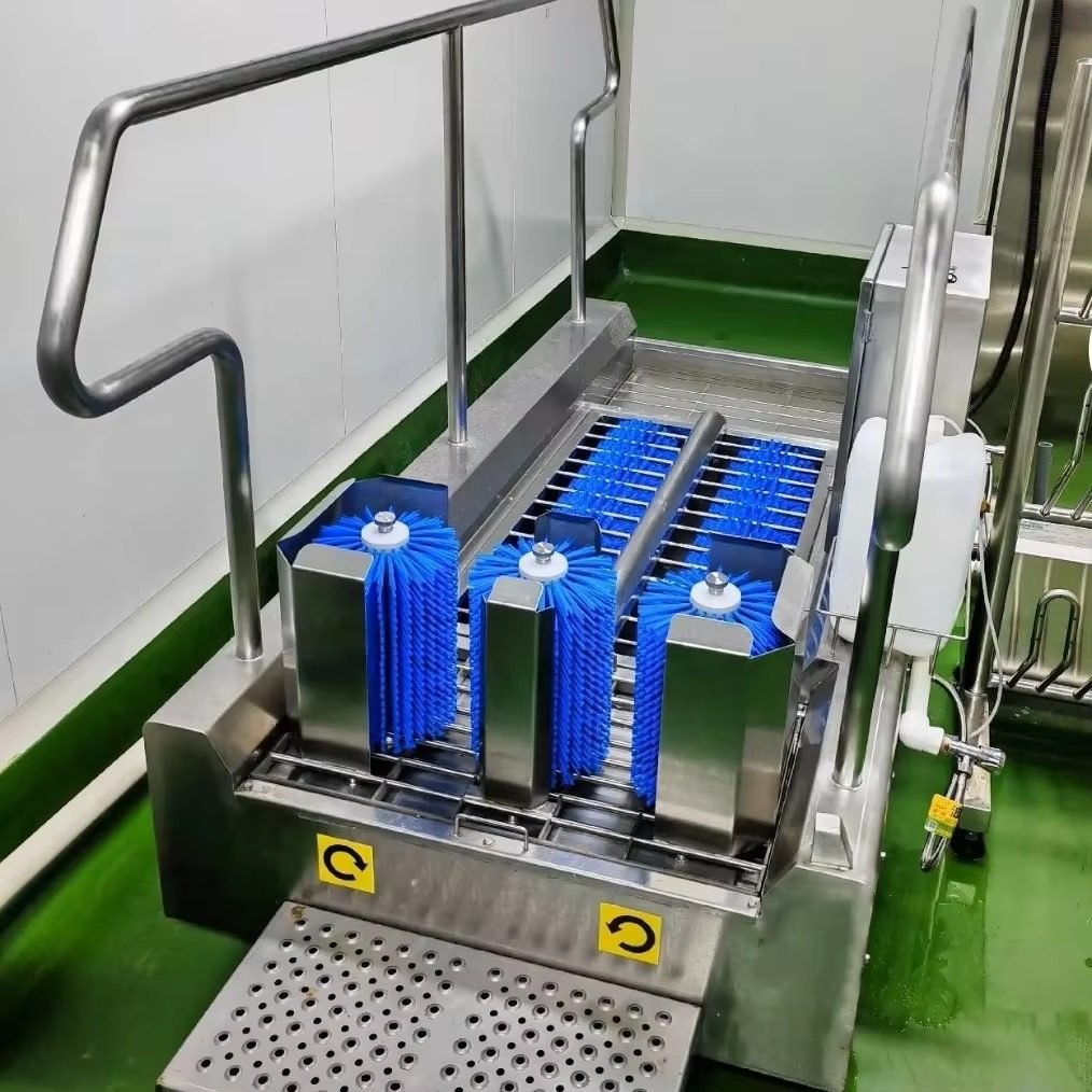 Close-up of the Klevo GS series wet roller brushes installed at a production entrance